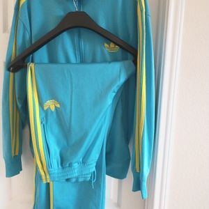 Adidas Sky Blue and Yellow adidas stripes.